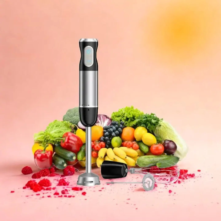 Mixeur et fruits sur fond rose et orange