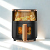 Air fryer noir sur fond blanc