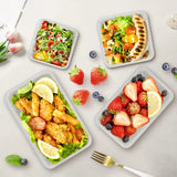 Boite plastique remplies d'aliments sur une table blanche 