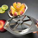 Coupe pomme inox et pomme sur fond gris