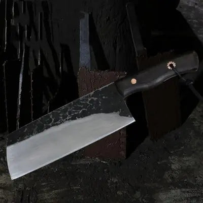 Couteau en manganèse sur fond noir