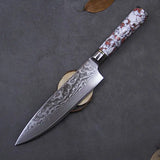 Couteau de chef en acier damas manche rouge et blanc sur fond gris