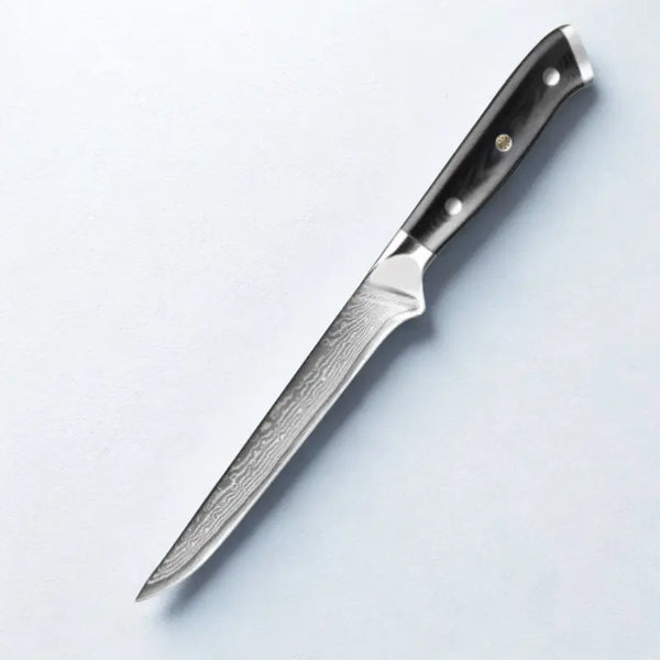 Couteau en acier damas sur fond blanc