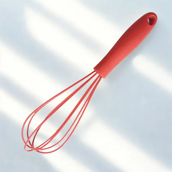 Fouet rouge sûr fond blanc