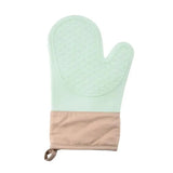 Gant turquoise sur fond blanc