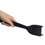 Spatule à œufs noir sûr fond blanc