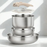 Set de poêles et casseroles avec manche amovible sur fond blanc
