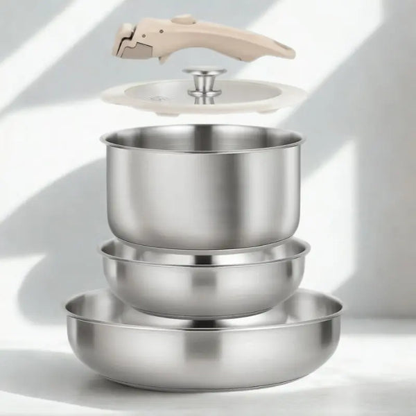 Set de poêles et casseroles avec manche amovible sur fond blanc