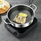 Marmite en inox sur plaque de cuisson