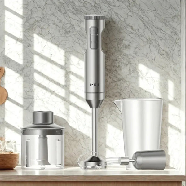 Mixeur 4 en 1 gris sur fond blanc marbré