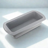 Moule rectangulaire gris sur fond blanc