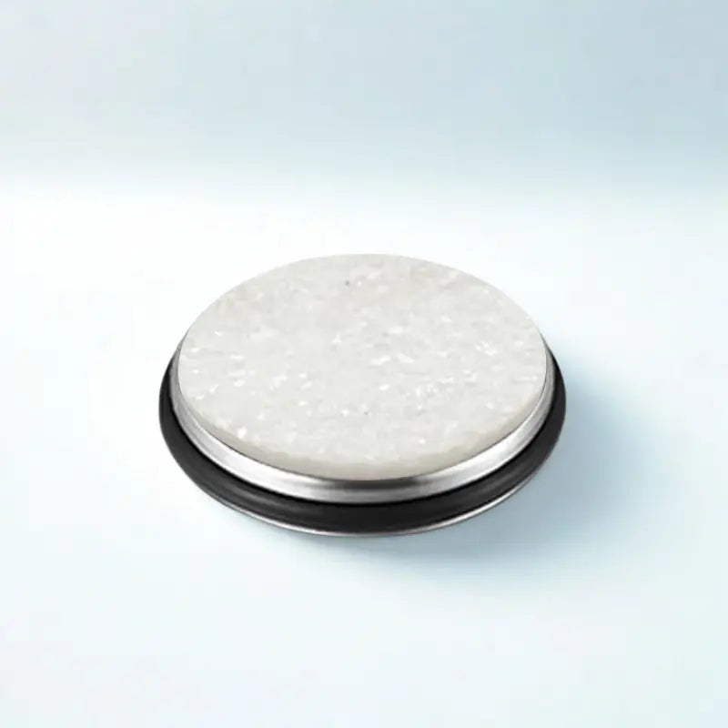 Disque pierre sûr fond blanc