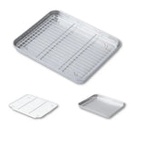 Plaques inox et grille sur fond blanc