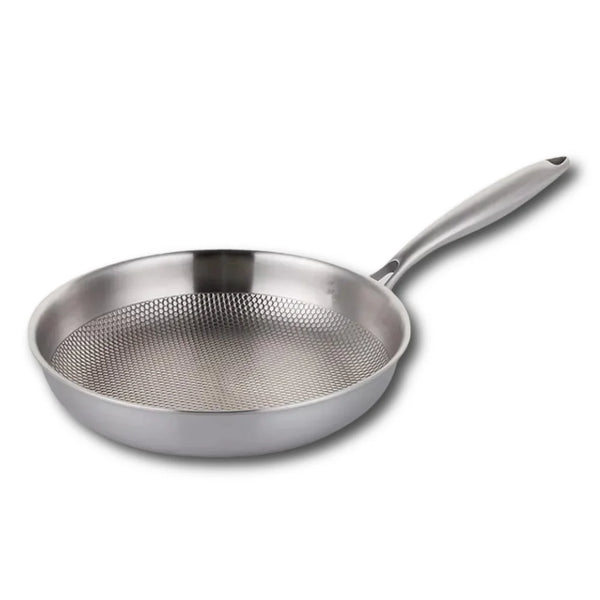 Poêle en inox avec fond nid d'abeille sur fond blanc