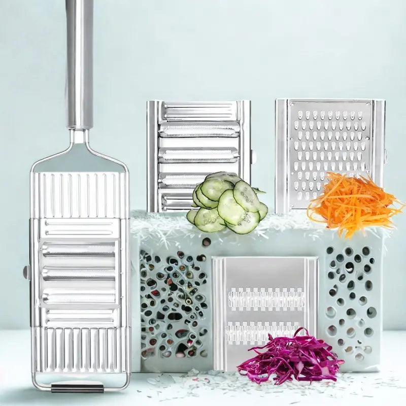 Mandoline en inoxydable sûr fond blanc avec 3 lames