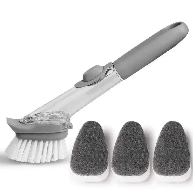 Brosse avec réservoir et ses têtes d'éponge disposées à côté sur fond blanc.