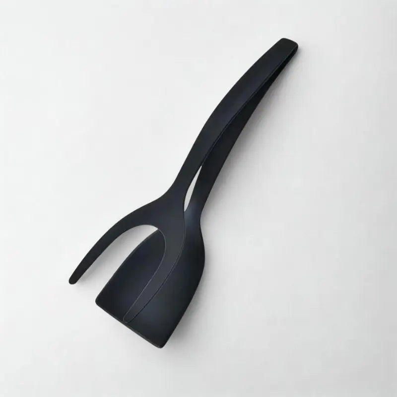 Spatule noire sur fond blanc