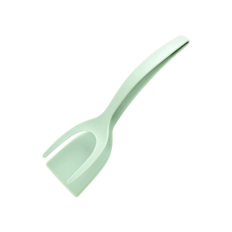 Spatule turquoise sur fond blanc