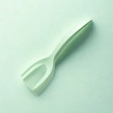 Spatule turquoise sur fond blanc