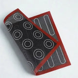 Tapis de cuisson double face sur fond blanc