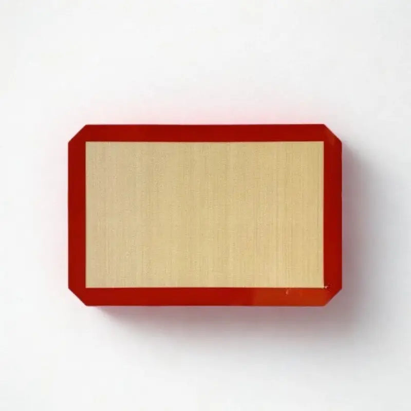 Tapis pâtissier sur fond blanc