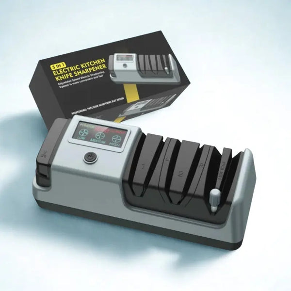 Aiguiseur électrique et sa boîte sur fond blanc 