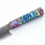 Couteau damas, manche bleu et violet sur fond blanc