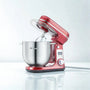 Robot pâtissier rouge sur fond blanc