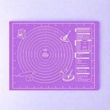Tapis violet gradué sur fond bleuté